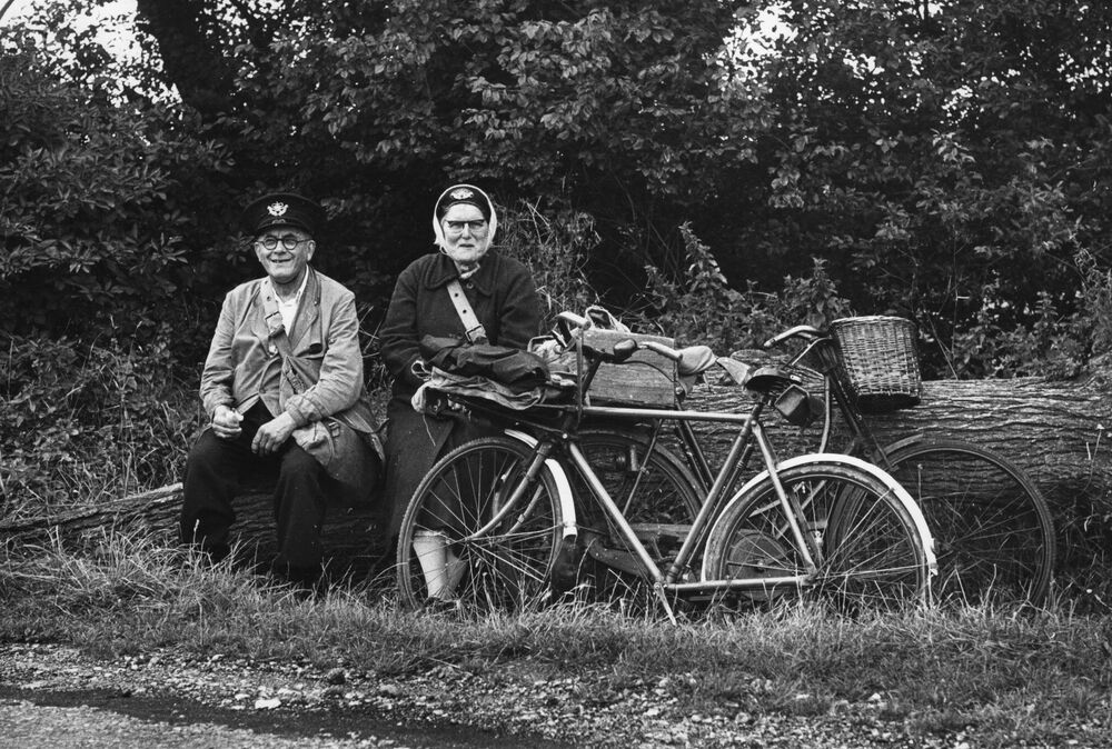 Norfolk postman and wife, UK