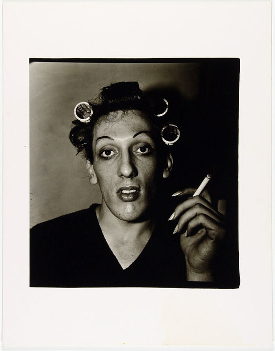 A young man in curlers at home on West 20th Street, N.Y.C.