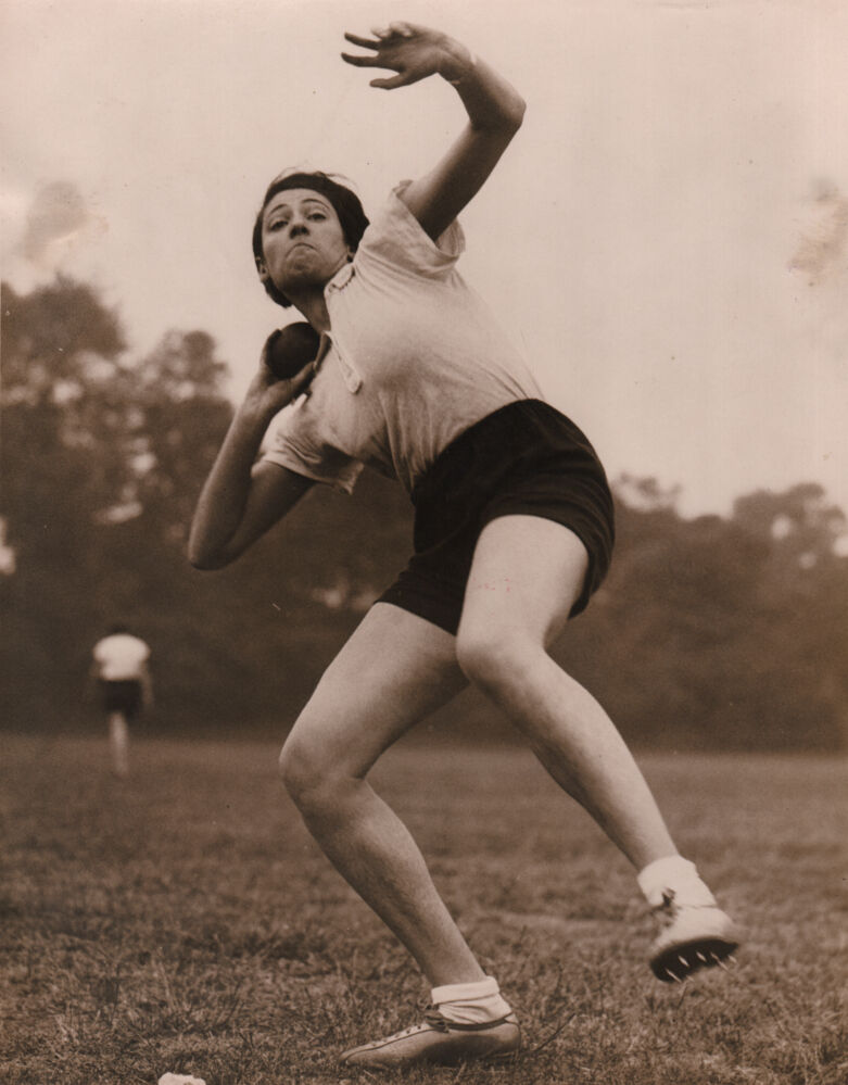 The athletic Fraulein, Miss Bergmann, practising putting